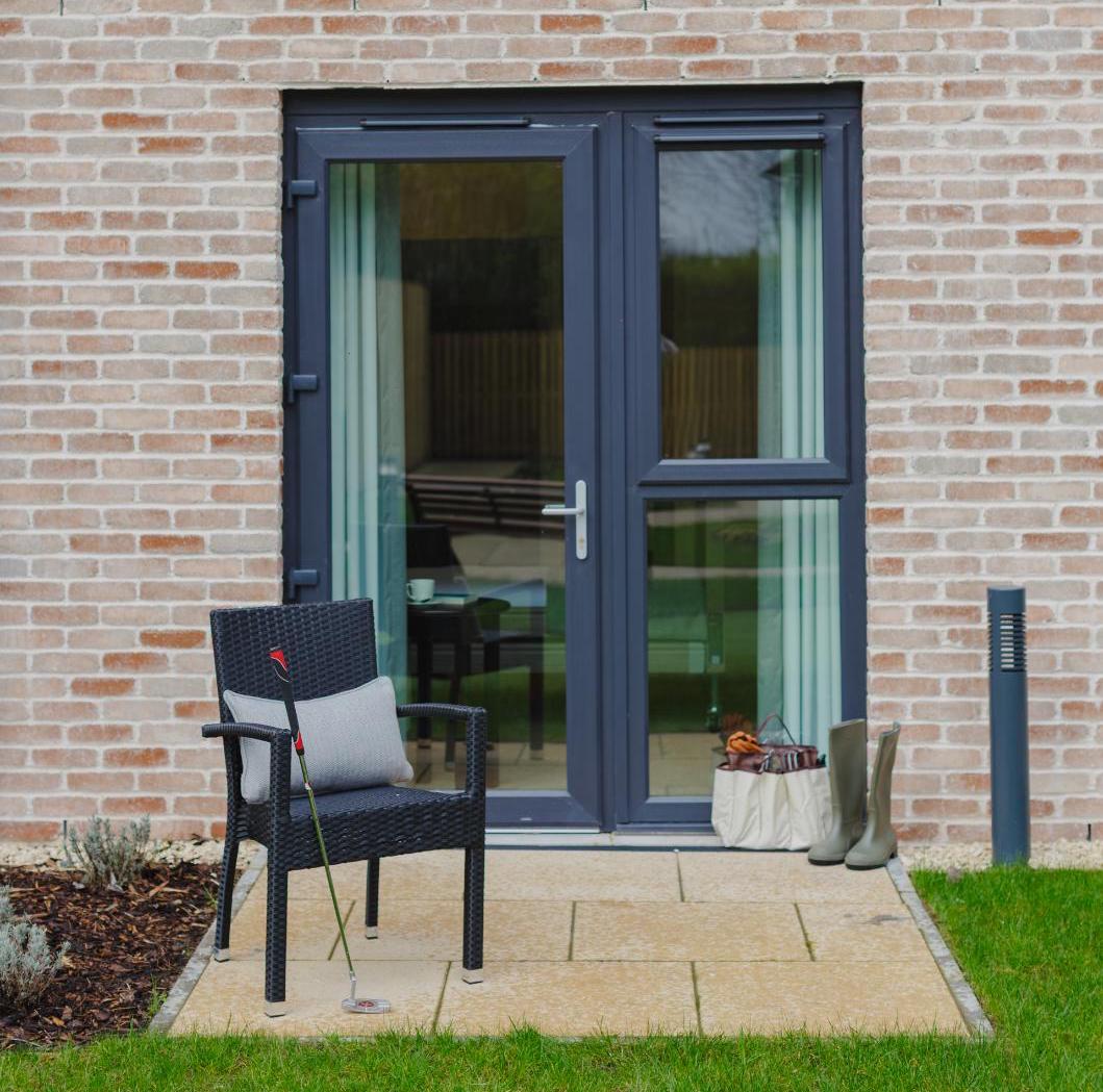 chair outside bedroom patio door