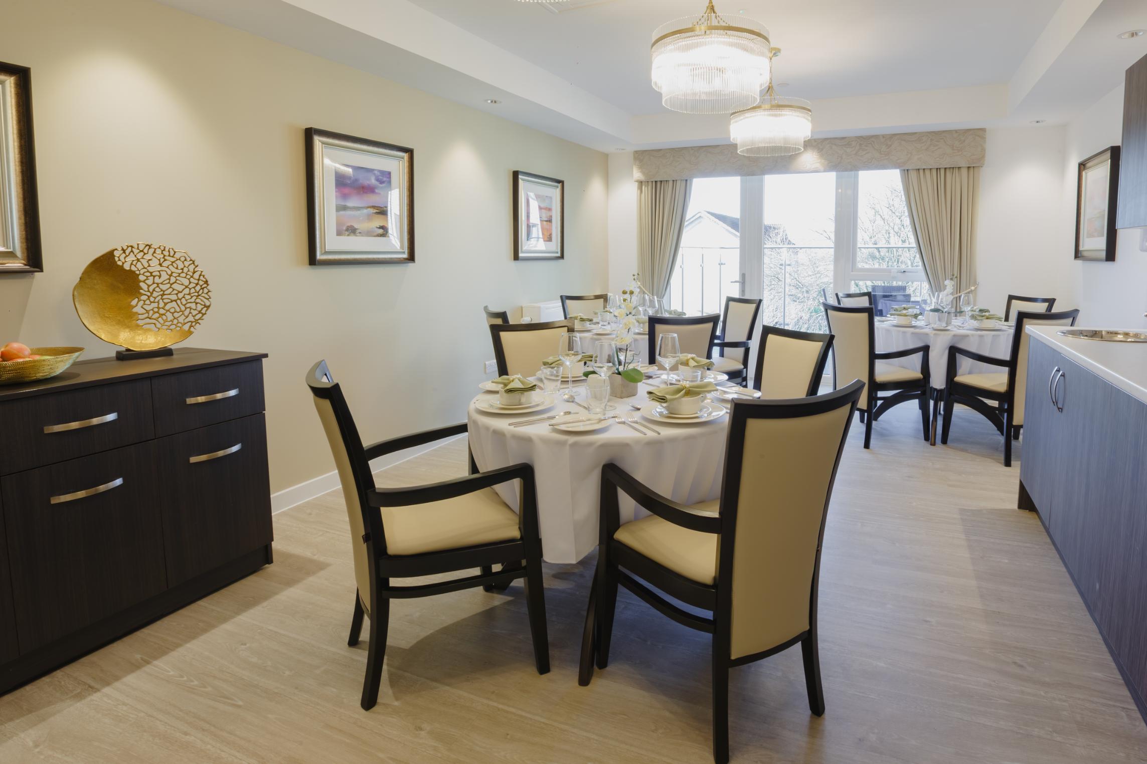 communal dining room with tables and chairs